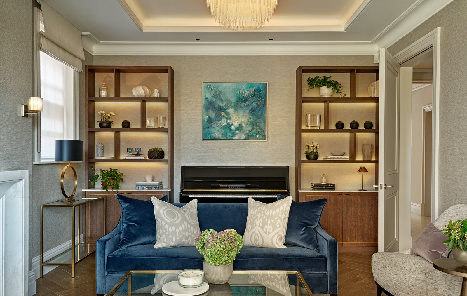 Architectural fixtures and pendant lights over the kitchen island in house in Wimbledon Village