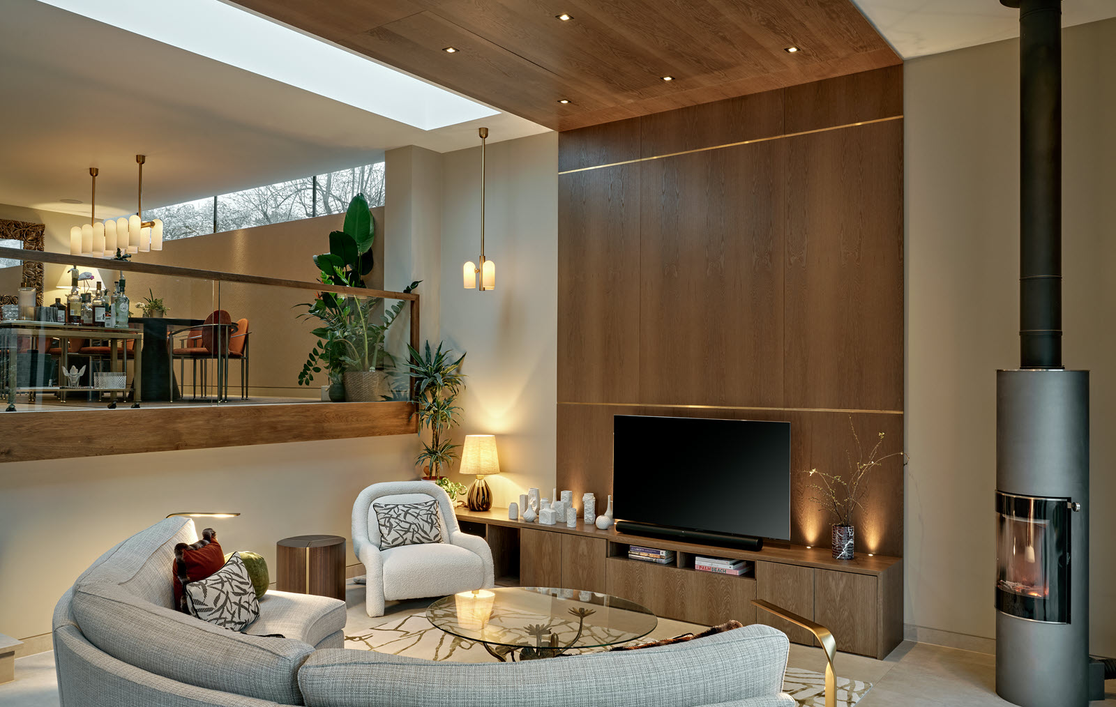 Architectural fixtures and pendant lights over the kitchen island in house in Wimbledon Village